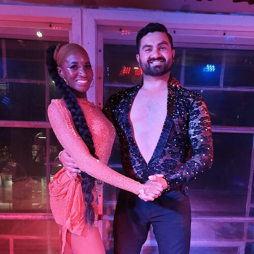 Photo of JC Camarena and his partner in dance clothes